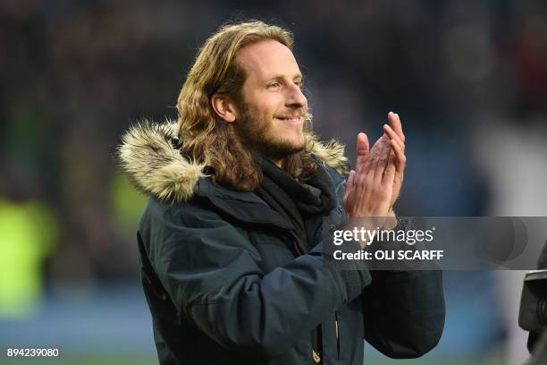 Former West Brom player, Swedish defender Jonas Olsson is introduced to the crowd ahead of the English Premier League football match between West...