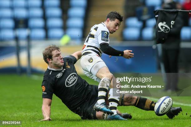 Wasps' Joe Launchbury beats La Rochelle's Jean Victor Goillot to the ball with his foot during the European Rugby Champions Cup match between Wasps...