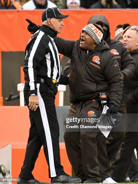 Head coach Hue Jackson of the Cleveland Browns argues a defensive penalty call with an official in the fourth quarter of a game on December 10, 2017...