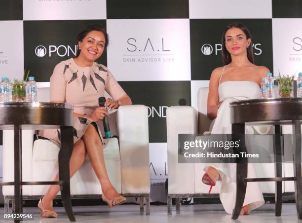 Bollywood actor and Pond's brand Ambassador Amy Jackson with Pond's expert Dr. Rashmi Shetty during the launch of Skin Advisor Live mobile...