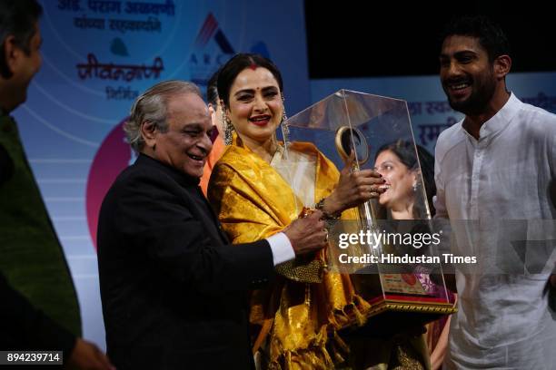 Bollywood actor Rekha receiving the first Smita Patil Memorial Award 2017 for her contribution in the field of cinema, by the hands of well known...