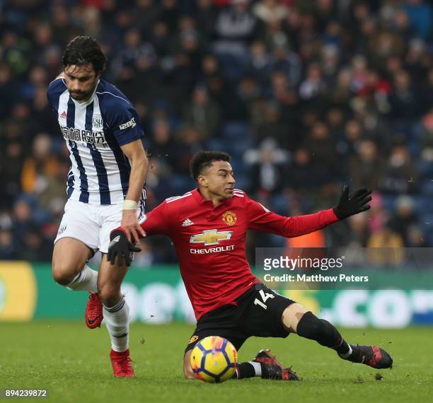 Jesse Lingard of Manchester United in action with Claudio Yacob of West Bromwich Albion during the Premier League match between West Bromwich Albion...