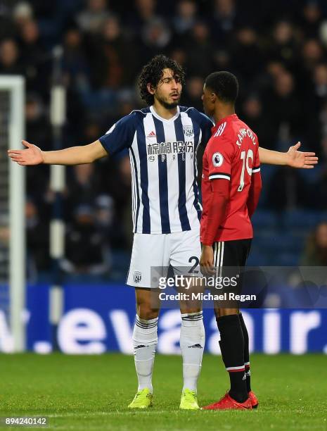 Marcus Rashford of Manchester United confronts Ahmed El-Sayed Hegazi of West Bromwich Albion during the Premier League match between West Bromwich...