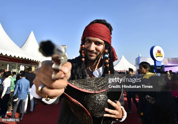 People pose with Comic Characters during the Delhi Comic Con 2017 at NSIC Exhibition Grounds, Okhla, on December 17, 2017 in New Delhi, India. Delhi...