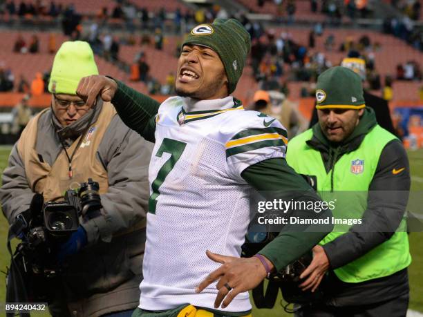 Quarterback Brett Hundley of the Green Bay Packers gestures toward the crowd as he walks off the field after a game on December 10, 2017 against the...