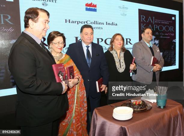 Bollywood actor Randhir Kapoor, author Ritu Nanda, actor Rishi Kapoor, Reema Jain and actor Rajiv Kapoor during the launch of author Ritu Nanda's...