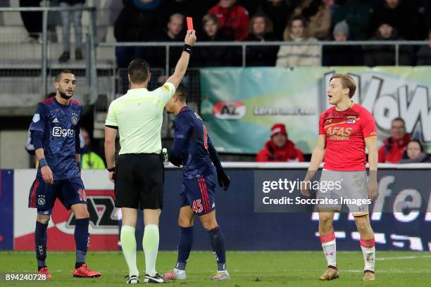 Jonas Svensson of AZ Alkmaar receives a red card from referee Danny Makkelie during the Dutch Eredivisie match between AZ Alkmaar v Ajax at the AFAS...
