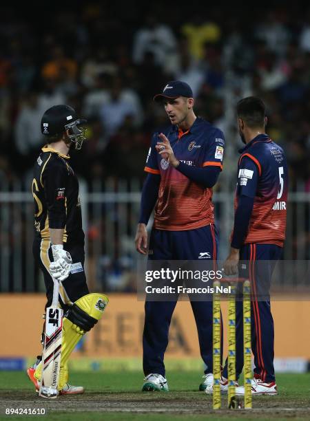 Alex Hales of Maratha Arabians speaks to Eoin Morgan of Kerela Kings during the T10 League semifinal match between Kerela Kings and Maratha Arabians...