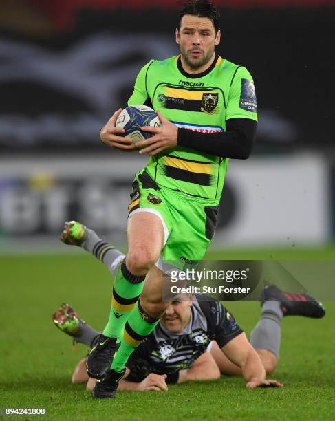 Saints fullback Ben Foden makes a break during the European Rugby Champions Cup match between Ospreys and Northampton Saints at Liberty Stadium on...
