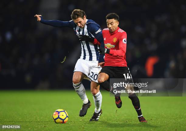 Grzegorz Krychowiak of West Bromwich Albion battles for possesion with Jesse Lingard of Manchester United during the Premier League match between...