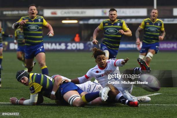 Seb Davies of Cardiff loses the ball on the try line after a challenge from Paolo Odogwu of Sale during the European Rugby Challenge Cup Pool Two...