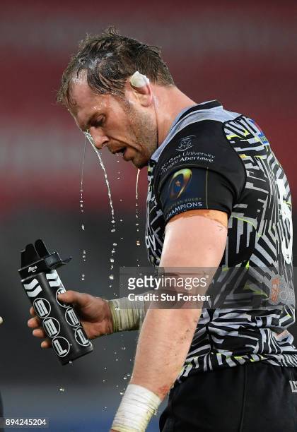Alun Wyn Jones of the Ospreys pours water over his head during the European Rugby Champions Cup match between Ospreys and Northampton Saints at...