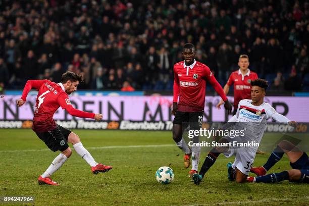 Julian Korb of Hannover 96 scores a goal to make it 4-4 during the Bundesliga match between Hannover 96 and Bayer 04 Leverkusen at HDI-Arena on...