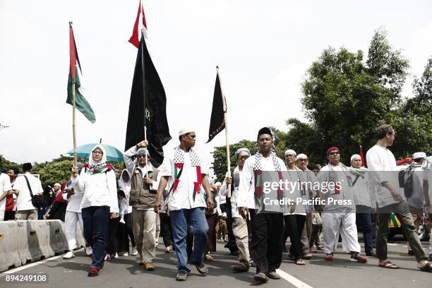 Indonesian Muslim activists shout slogans during protest opposing US President Donald J.Trump's decision to recognize Jerusalem as capital of Israel,...