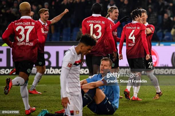 Julian Korb of Hannover 96 celebrates with his team-mates after scoring a goal to make it 4-4 during the Bundesliga match between Hannover 96 and...