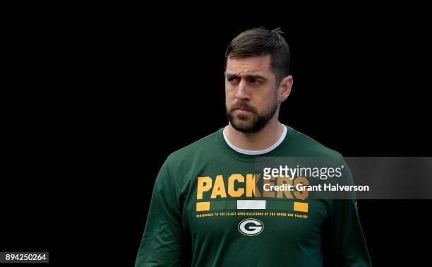 Aaron Rodgers of the Green Bay Packers warms up before their game against the Carolina Panthers at Bank of America Stadium on December 17, 2017 in...