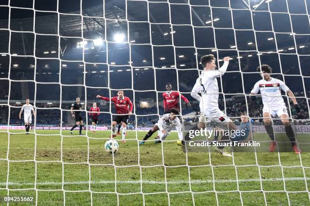 Julian Korb of Hannover 96 scores a goal to make it 4-4 during the Bundesliga match between Hannover 96 and Bayer 04 Leverkusen at HDI-Arena on...