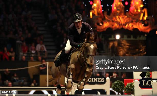 France's Jullien Epaillard riding Toupie de la Roque wins the Longines FEI World Cupduring day six of the London International Horse Show at London...