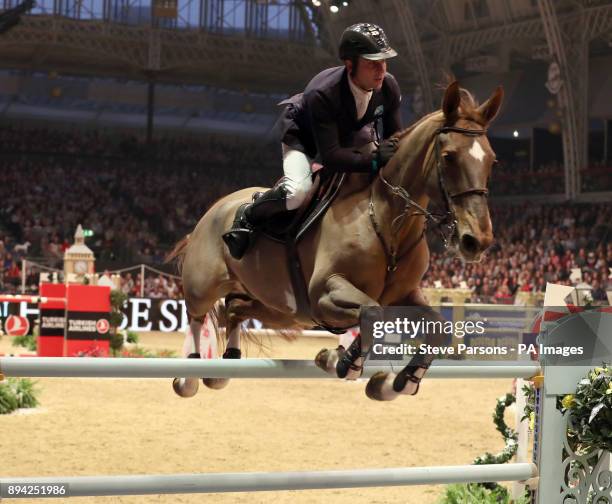 France's Jullien Epaillard riding Toupie de la Roque wins the Longines FEI World Cupduring day six of the London International Horse Show at London...