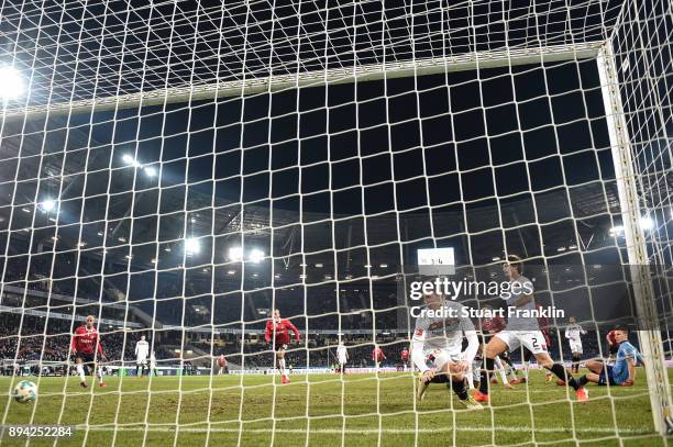 Julian Korb of Hannover 96 scores a goal to make it 4-4 during the Bundesliga match between Hannover 96 and Bayer 04 Leverkusen at HDI-Arena on...