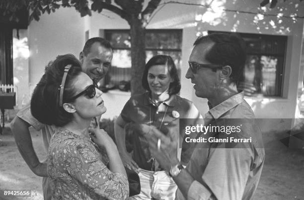 January 01, 1965. Saelices, Cuenca. Spain. The bullfighter Luis Miguel Dominguin and Lucia Bose are receiving the actress and singer Carmen Sevilla...