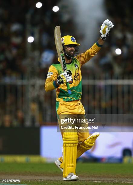 Ahmed Shehzad of Pakhtoons signals during the semi final T10 match between Pakhtoons and Punjabi Legends at Sharjah Cricket Stadium on December 17,...