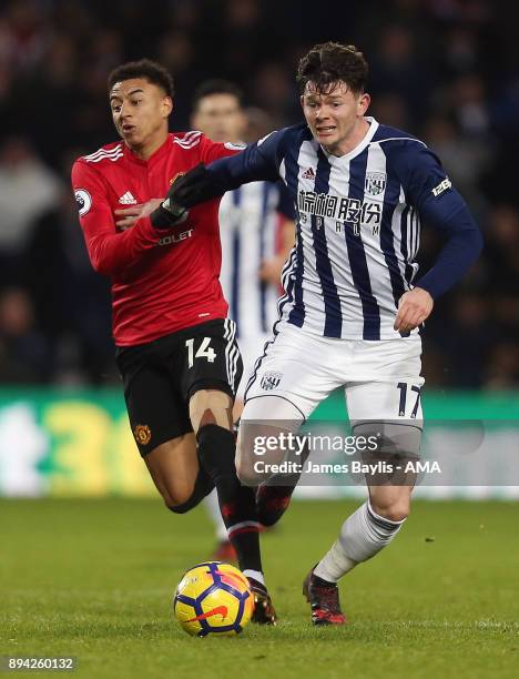 Jesse Lingard of Manchester United and Oliver Burke of West Bromwich Albion during the Premier League match between West Bromwich Albion and...