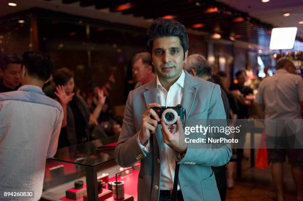 Leica Camera Asia Pacific business manager Eklavya Bakshi holds the newly launched Leica CL camera at an event in Kuala Lumpur, Malaysia on December...