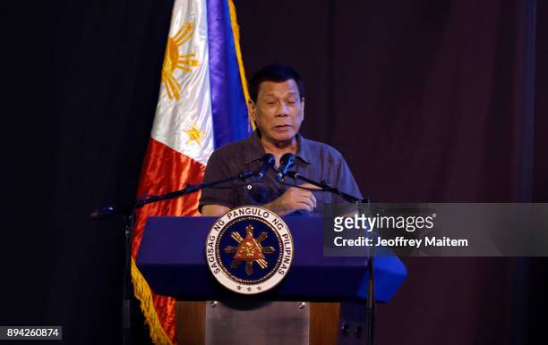 President Rodrigo Roa Duterte speaks at the 39th birthday party of Boxer Manny Pacquiao at KCC convention center on December 17, 2017 in General...