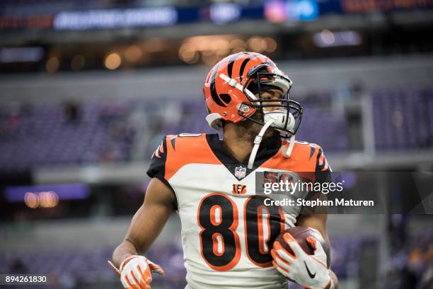 Josh Malone of the Cincinnati Bengals warms up before the game against the Minnesota Vikings on December 17, 2017 at U.S. Bank Stadium in...