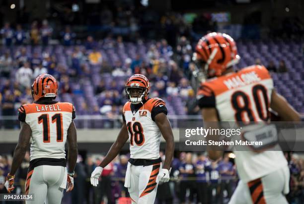 Brandon LaFell, A.J. Green, and Josh Malone of the Cincinnati Bengals warm up before the game against the Minnesota Vikings on December 17, 2017 at...