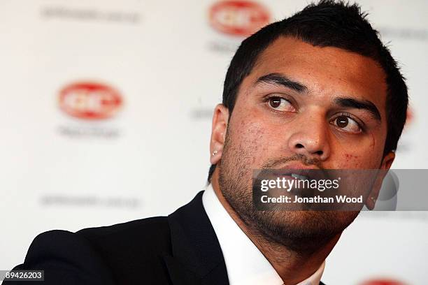 Brisbane Broncos NRL player Karmichael Hunt talks to the media during a press conference to announce that will be switching codes to play AFL for the...