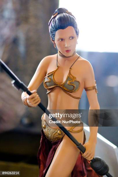 Figure Rey from Star Wars is exhibited at the 'Star Wars Exhibition' at Telefonica flagship store on December 17, 2017 in Madrid, Spain