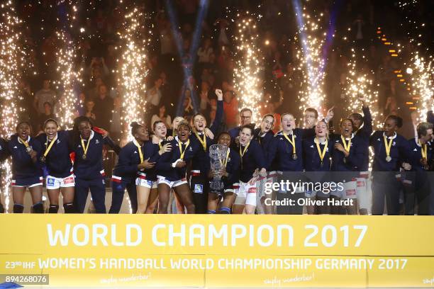 Team of France celebrate with the trophy after the IHF Women's Handball World Championship final match between France and Norway at Barclaycard Arena...