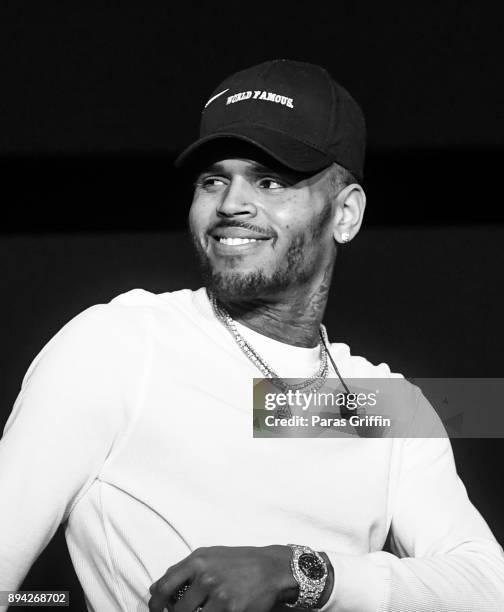 Singer Chris Brown performs onstage at 3rd Annual V-103 Winterfest Concert at Philips Arena on December 16, 2017 in Atlanta, Georgia.