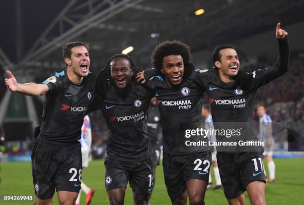 Cesar Azpilicueta, Victor Moses, Willian, and Pedro of Chelsea celebrate the third during the Premier League match between Huddersfield Town and...