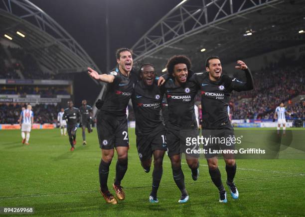 Cesar Azpilicueta, Victor Moses, Willian, and Pedro of Chelsea celebrate the third during the Premier League match between Huddersfield Town and...