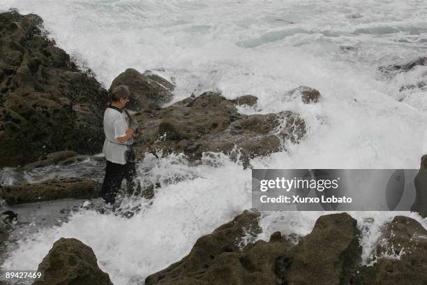 Corme, Galicia Mari Lista, percebeira hunting barnacles in Corme.