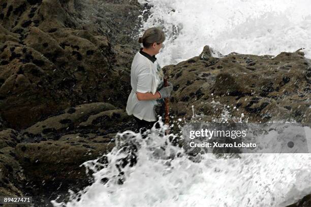 Corme, Galicia Mari Lista, percebeira hunting barnacles in Corme.