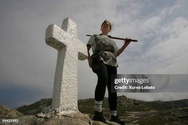 Roncudo, Galicia Mari Lista, percebeira, next to a cross that remember to the dead fishermen in O Roncudo.