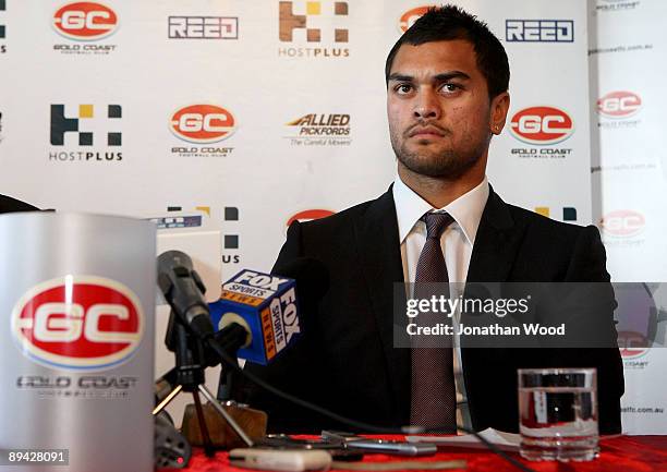 Brisbane Broncos NRL player Karmichael Hunt talks to the media during a press conference to announce that will be switching codes to play AFL for the...