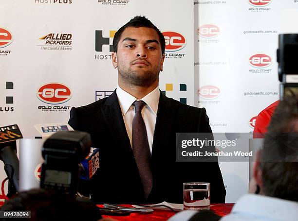 Brisbane Broncos NRL player Karmichael Hunt talks to the media during a press conference to announce that will be switching codes to play AFL for the...