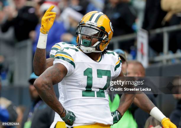 Davante Adams of the Green Bay Packers reacts after scoring a touchdown against the Carolina Panthers in the first quarter during their game at Bank...