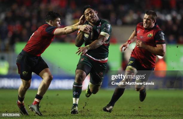 Manu Tuilagi of Leicester Tigers makes a break through the Munster defence during the European Rugby Champions Cup match between Leicester Tigers and...