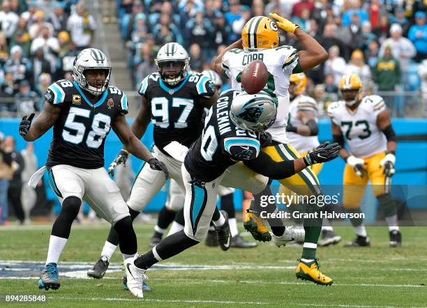 Kurt Coleman of the Carolina Panthers breaks up a pass intended for Randall Cobb of the Green Bay Packers during their game at Bank of America...