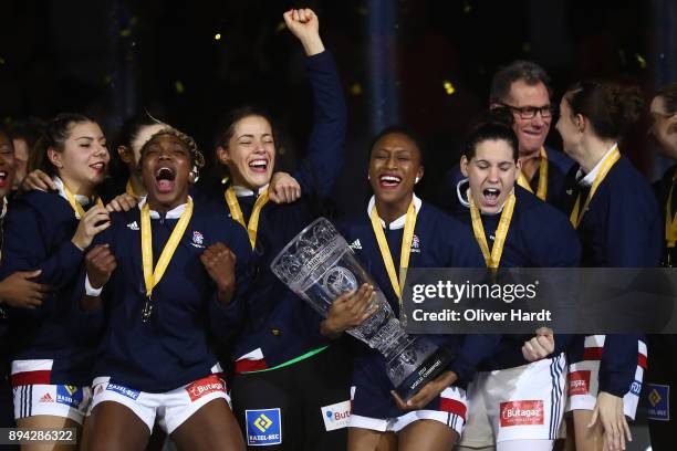 Team of France celebrate with the trophy after the IHF Women's Handball World Championship final match between France and Norway at Barclaycard Arena...