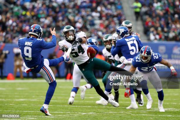 Kamu Grugier-Hill of the Philadelphia Eagles blocks a punt hicked by Brad Wing of the New York Giants during the second quarter in the game at...