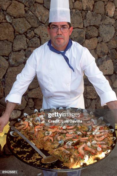 Cook with a sea food paella.
