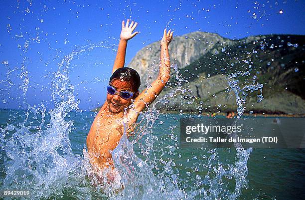 Child playing in the water