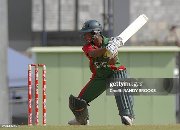 Bangladesh batsman Mohammad Ashraful cuts West Indies bowler David Bernard Jr for 4 en route to his 64 runs during the 2nd one day international at...